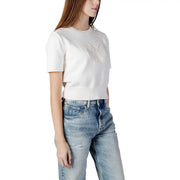 Calvin Klein Pull en maille beige en coton pour femme, col rond et manches courtes blanches. top et motif de papillon brodé