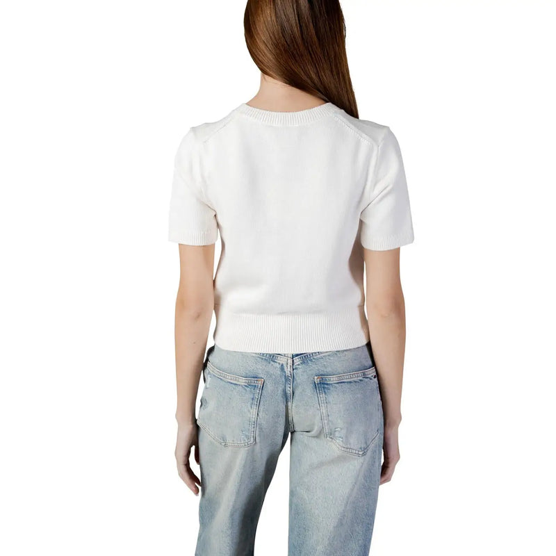 Pull en coton blanc à manches courtes top avec encolure et ourlet côtelés de Calvin Klein collection de vêtements pour femmes en maille de coton beige à col rond