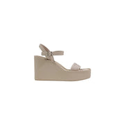 Beige Calvin Klein women platform wedge sandal with thin ankle strap and decorative buckle