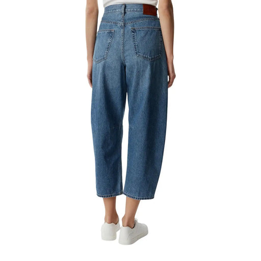 Calvin Klein Jean en denim bleu de coton pour femme, dos dévoilant le dos, taille haute, coupe large et passant de ceinture en cuir marron