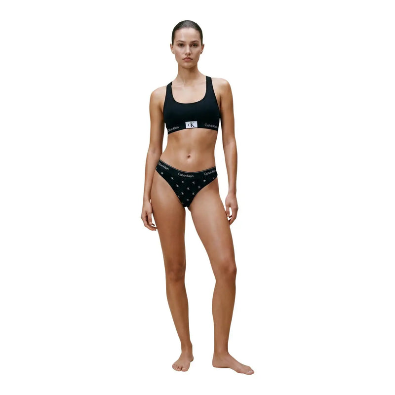 Noir Calvin Klein Ensemble bikini brésilien pour femme en coton modal, composé d'un soutien-gorge élégant et d'une culotte blanche à motif d'ancre.