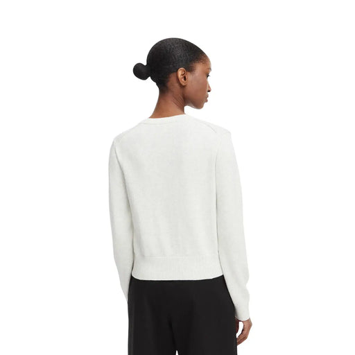 Pull Calvin Klein pour femme, en maille de coton blanc, col rond minimaliste, poignets côtelés