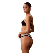 String noir en coton Calvin Klein pour femme, avec ceinture élastique blanche ornée du logo de la marque