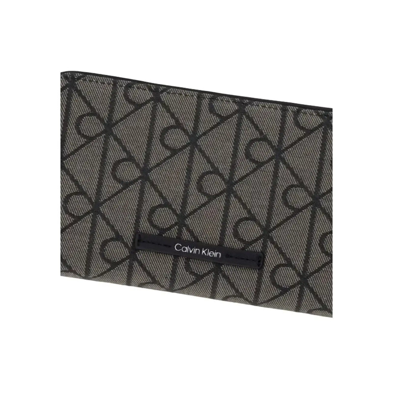 Portefeuille Calvin Klein noir pour femme, en polyester noir à motif géométrique gris foncé, taille 11 cm.