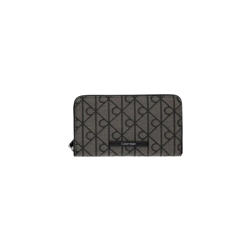 Noir Calvin Klein Portefeuille pour femme en polyester avec un motif monogramme répété sur tissu texturé