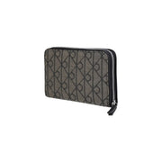 Calvin Klein Portefeuille femme en polyester noir orné d'un élégant motif géométrique gris foncé et d'une fermeture éclair noire.