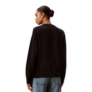 Pull Calvin Klein pour femme, en maille de coton noir, col rond, bords-côtes au col et aux poignets (vue de face)