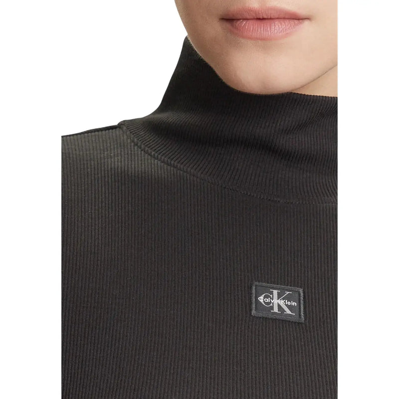Calvin Klein Pull à col roulé en maille côtelée noire pour femme top avec un écusson logo sur la poitrine