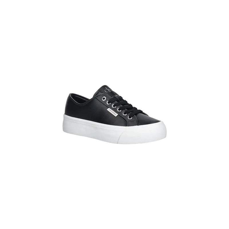 Calvin Klein women leather sneaker black platform with white sole silver eyelets and logo on the tongue