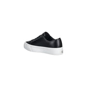 Back view of calvin klein women leather sneaker in black with white rubber sole and silver logo on heel