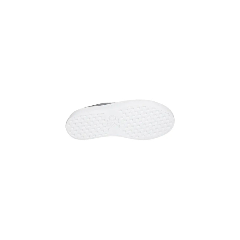 White rubber sole with textured pattern and gray accents on the edge of calvin klein women leather sneaker black platform