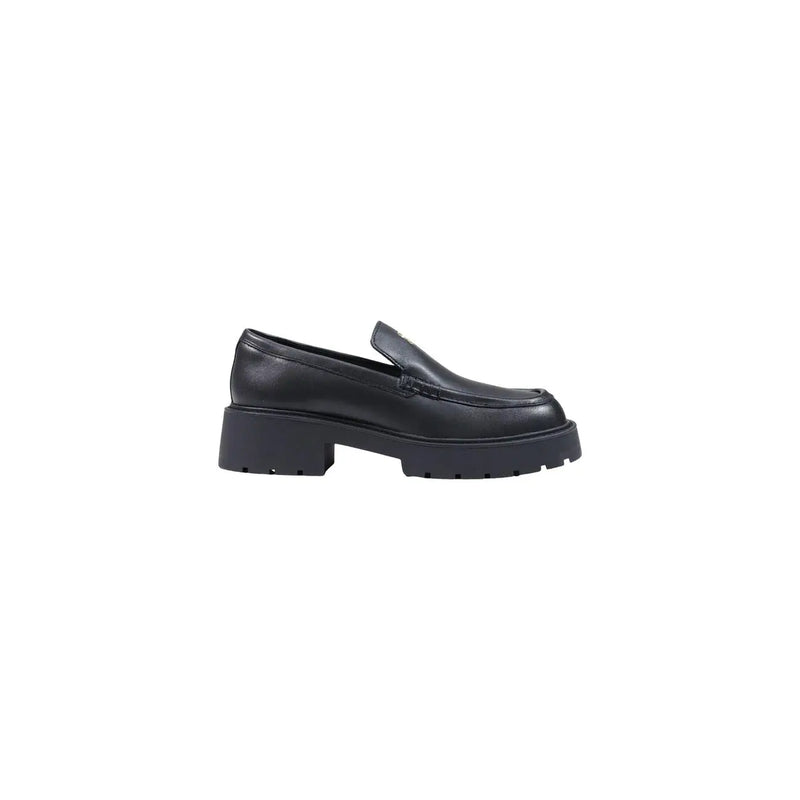 Calvin klein women leather sneakers black featuring a black leather loafer with chunky platform sole visible from the back side