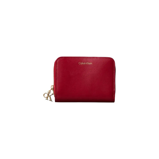 Calvin Klein Portefeuille femme en cuir rouge, fermeture éclair, détails dorés et breloque logo CK, L11 x H8 cm