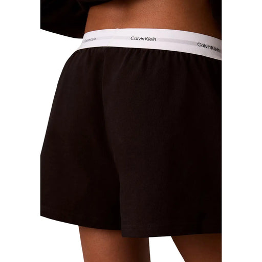 Calvin Klein Boxer noir en jersey de coton pour femme, avec ceinture élastique blanche ornée du logo de la marque