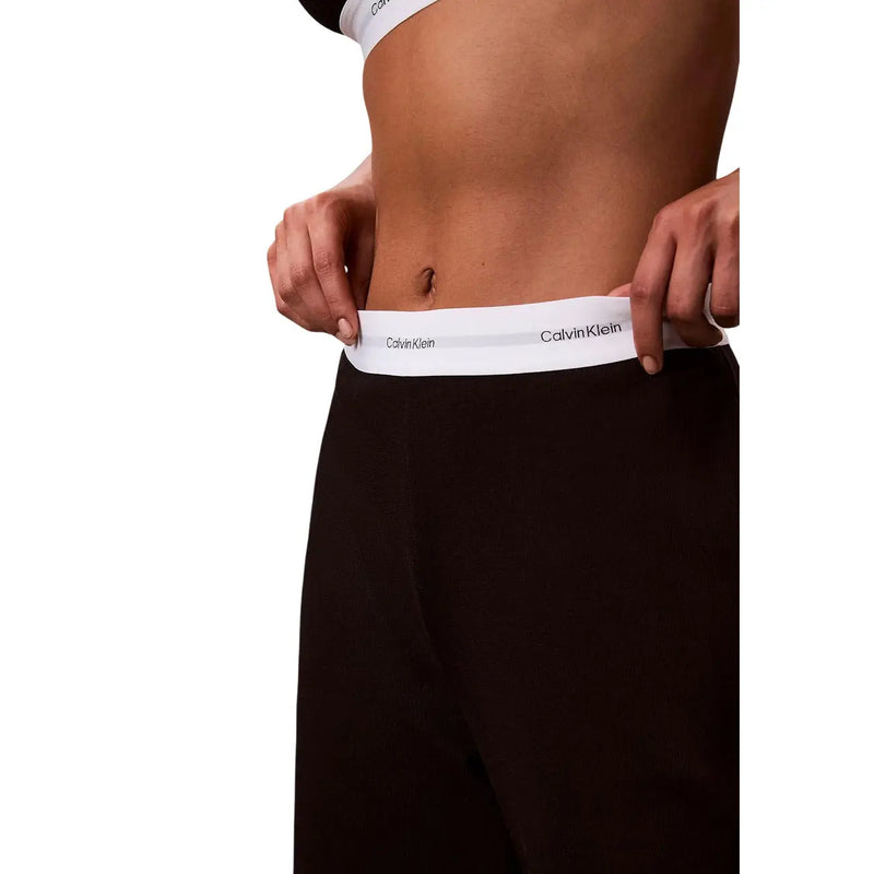 Noir Calvin Klein Culotte en jersey de coton pour femme, avec logo, ceinture élastique blanche et inscription noire.