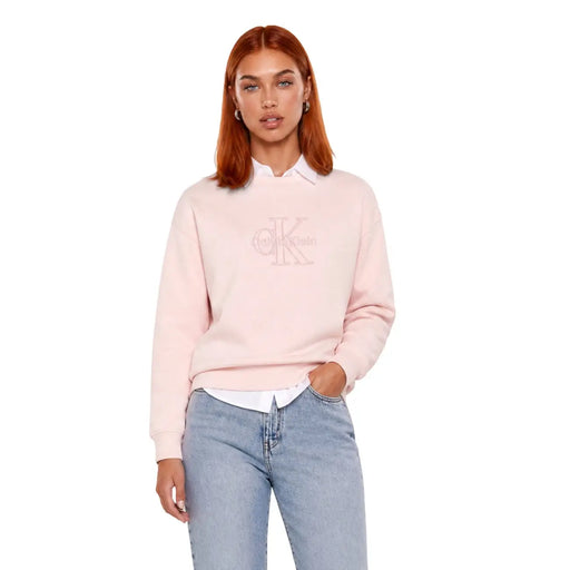 Calvin Klein Sweat-shirt rose en coton pour femme, à la texture douce et orné d'un logo brodé discret sur la poitrine.