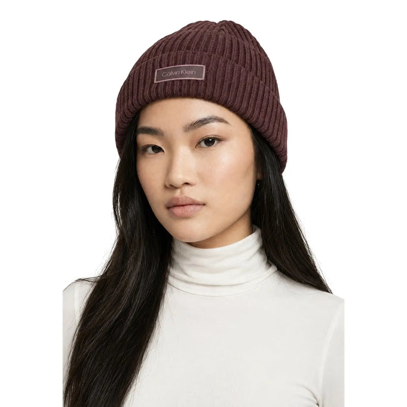 Calvin Klein women purple rib cotton beanie featuring a maroon ribbed knit design with logo patch