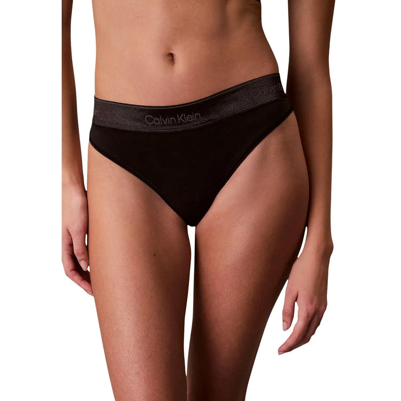 Noir Calvin Klein String en polyester avec une bande discrète à logo gris pour sous-vêtements féminins dévoilant l'arrière