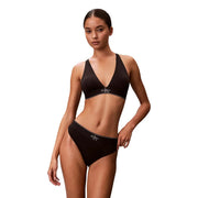 Ensemble bikini Calvin Klein noir, au design minimaliste et orné du logo blanc, en polyester blanc.