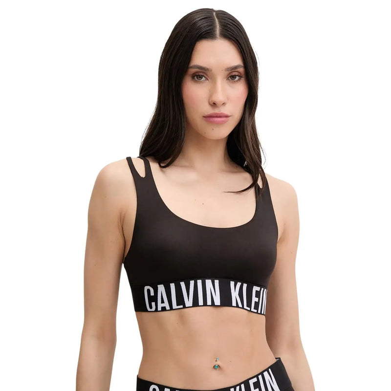 Noir Calvin Klein Soutien-gorge de sport pour femme avec bande logo blanche sur la poitrine, en coton modal.
