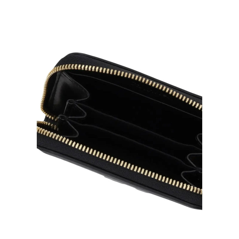 Calvin Klein Portefeuille femme en polyuréthane noir avec fermeture éclair dorée et compartiments internes mesurant 10 x 7 x 2 cm
