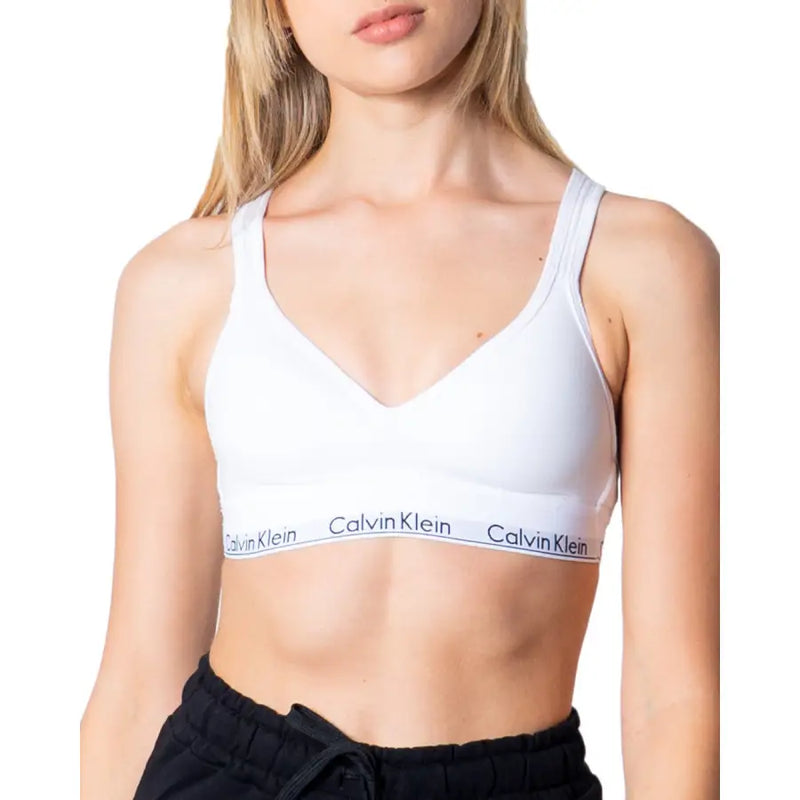 White Calvin Klein V-neck sports bra with logo band
