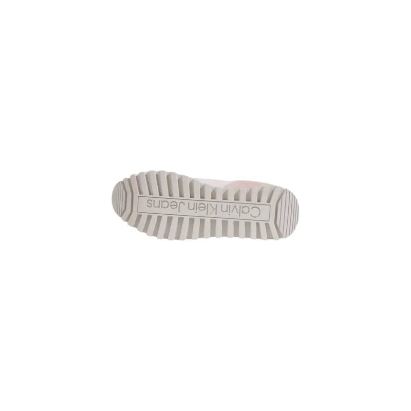 Calvin klein women’s lilac leather sneakers shown from the back with pink and white ribbed rubber sole