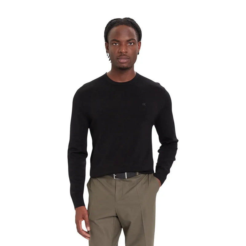 Calvin Klein Pull en laine noir pour homme, manches longues et col rond, vue de face
