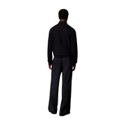 Calvin Klein Pull en laine noire pour homme, en maille côtelée aux poignets et au col, vue de face