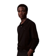 Calvin Klein Pull en laine noir pour homme, manches longues, logo brodé sur la poitrine, vue de face
