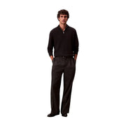 Calvin Klein Pull à col roulé en laine noire pour homme, à maille côtelée et fermeture éclair au quart, vue de face