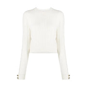 White ribbed knit sweater with gold-tone cuff buttons from Chiara Ferragni collection