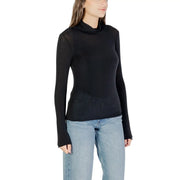 Black long-sleeved turtleneck top with sheer fitted silhouette made of cashmere modal from choral women collection