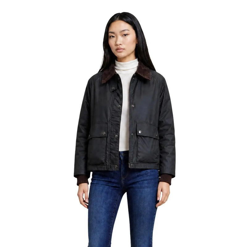 Black waxed cotton field jacket with brown shearling collar and cuffs shown from the front in choral women green cotton blazer style