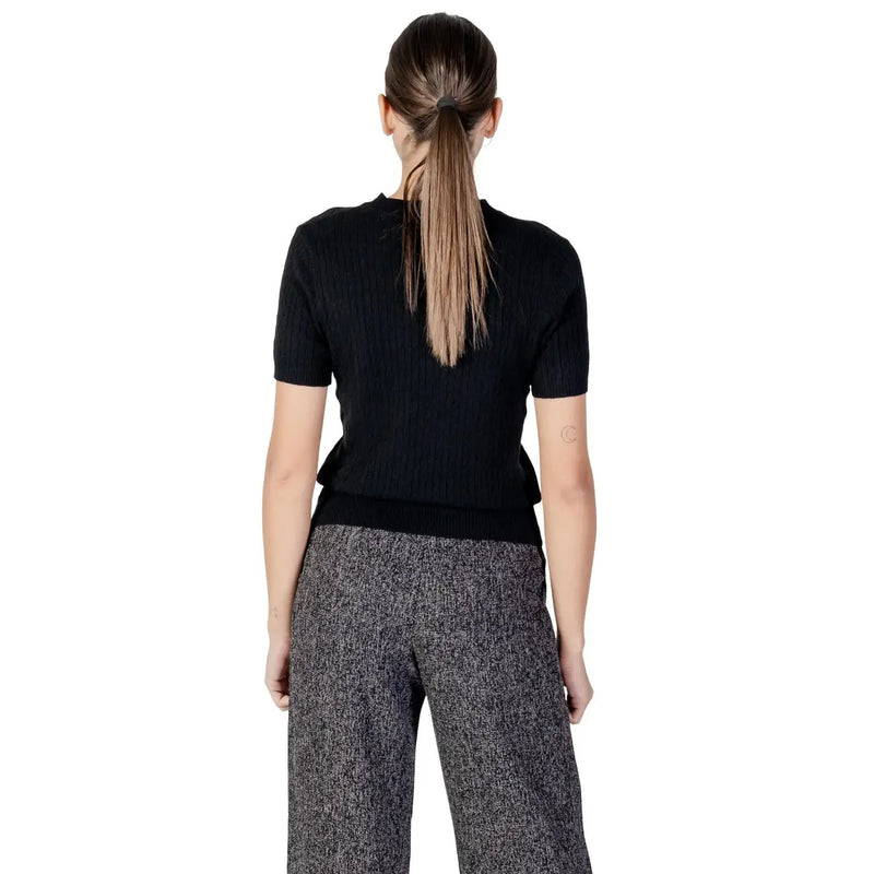 pull à manches courtes en maille côtelée noire top à col rond de la collection de tricots pour femmes Choral