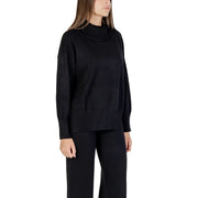 Pull à col roulé noir en maille côtelée pour femme Choral, manches longues et coupe légèrement ample