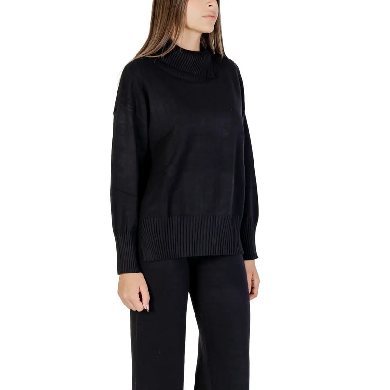 Pull à col roulé noir en maille côtelée pour femme Choral, manches longues et coupe légèrement ample