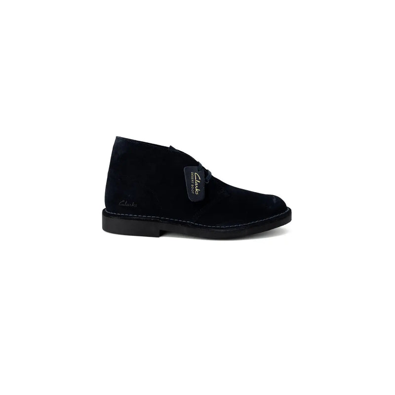 Bottines désert Clarks en daim noir, style chukka classique, ornées de surpiqûres, dans une collection de chaussures Clarks pour homme en cuir bleu à lacets.