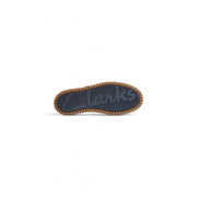 Mocassins Clarks pour homme en cuir bleu, chaussures décontractées avec semelle en caoutchouc gris foncé et bord texturé beige