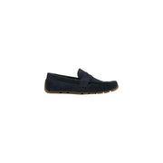 Mocassin Clarks pour homme, en daim bleu marine, avec semelle en caoutchouc beige et détails cousus, idéal pour le printemps et l'été.