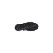 Semelle en caoutchouc noir avec semelle crantée et logo Clarks en relief sur bottines Clarks pour homme en daim noir à lacets, collection printemps-été
