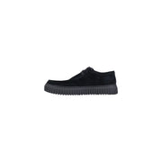 Chaussure Clarks pour homme en daim noir, à enfiler, avec semelle épaisse en caoutchouc côtelé, idéale pour le printemps et l'été.