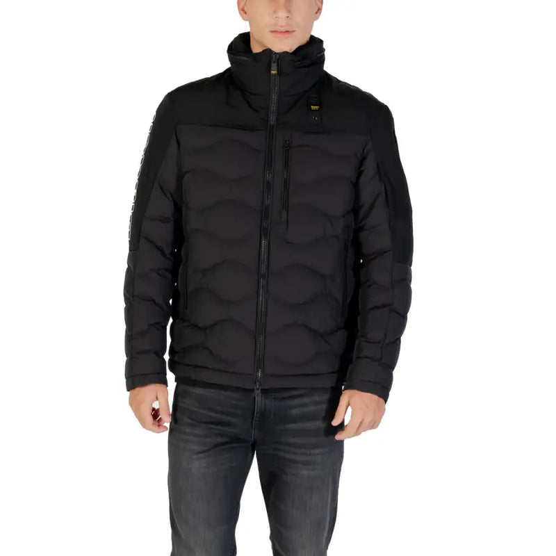 Black puffer jacket with hood and zipper, made of synthetic material.