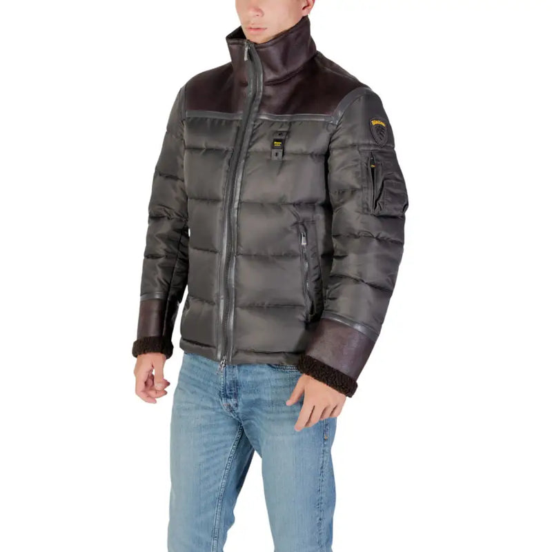 Black and brown quilted puffer jacket with fur-lined hood, likely from a popular outdoor brand.