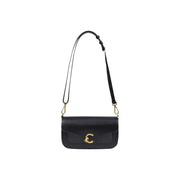 Coccinelle black leather crossbody bag with gold-tone c clasp and adjustable strap featuring inside pocket