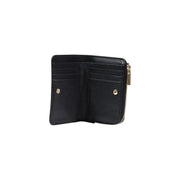 Coccinelle black leather zip wallet for women featuring textured leather with gold-tone zipper and hardware