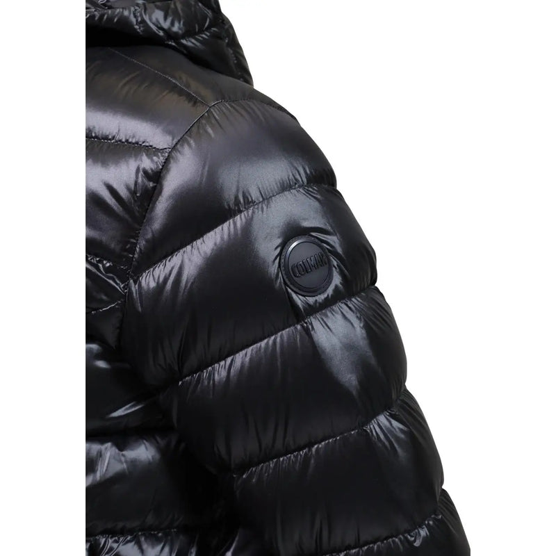 Doudoune Colmar Originals pour homme, noire, matelassée et brillante, avec logo rond sur la manche (vue de face).