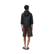 Veste à capuche noire en nylon pour femme Colmar Originals, ornée d'un matelassage noir et d'un style moderne et élégant.