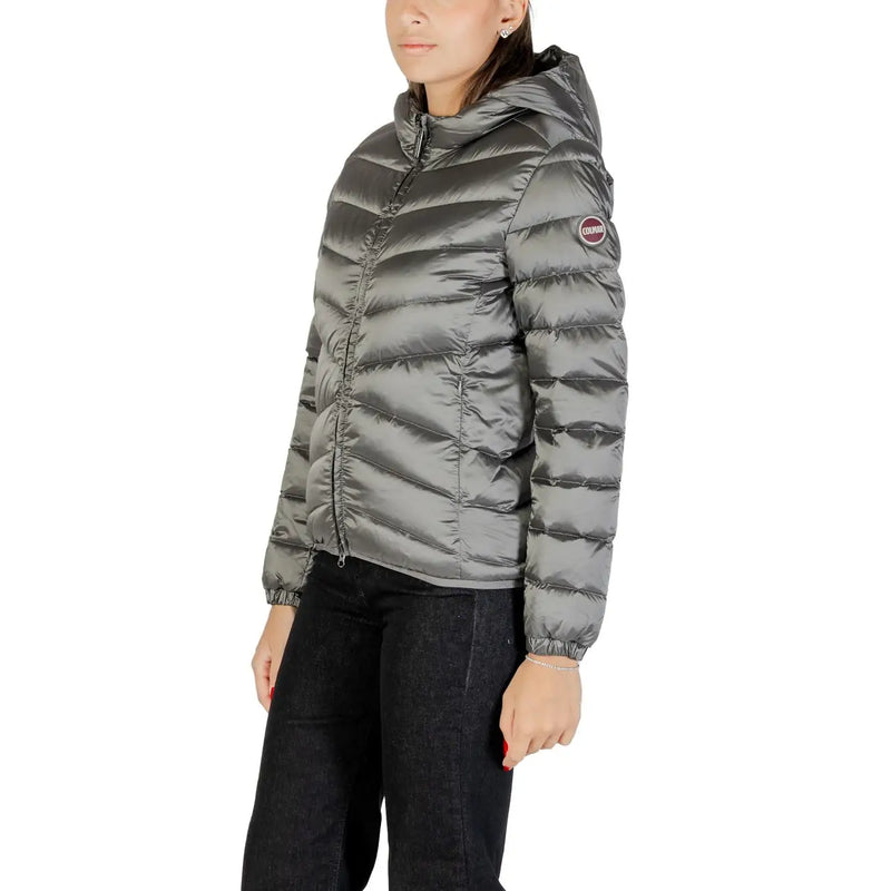 Veste matelassée grise en polyester Colmar Originals pour femme, avec capuche et logo discret sur la manche, finition métallisée élégante.