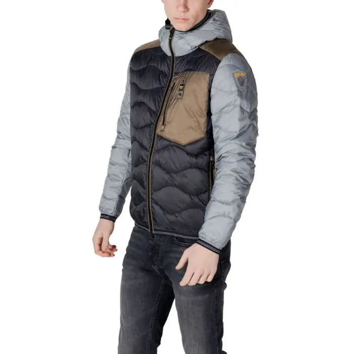 Color-blocked hooded puffer jacket for men showcasing stylish winter outerwear